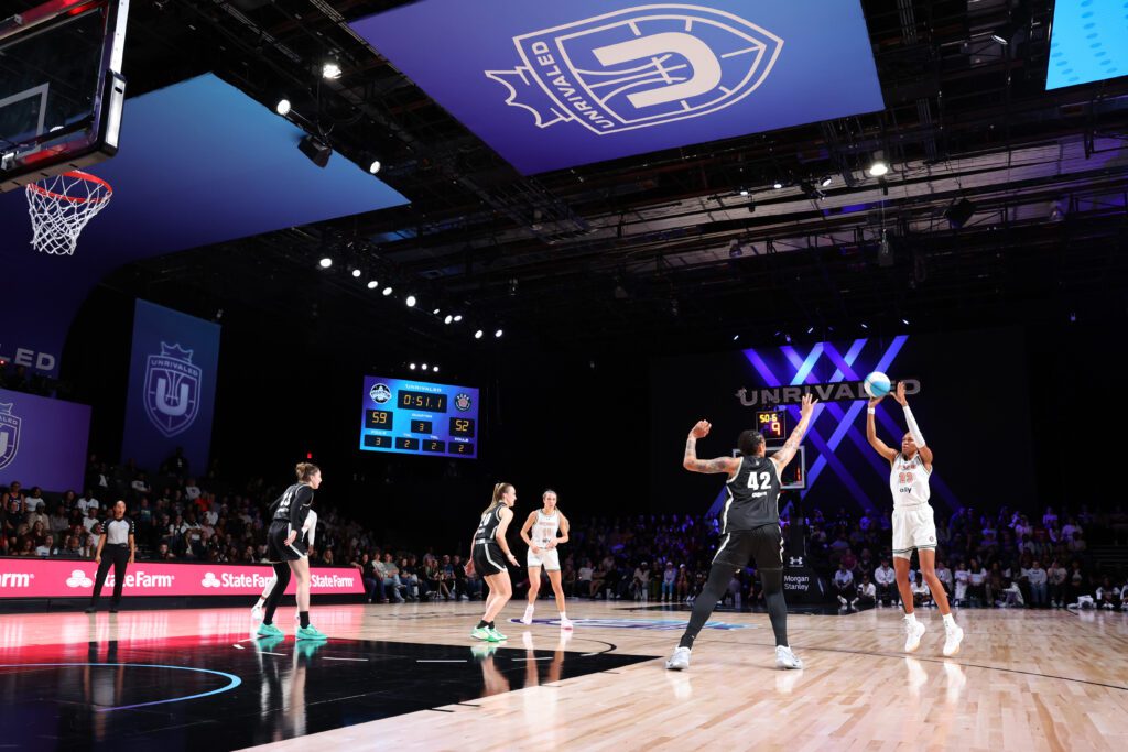 Rose BC's Azurá Stevens shoots a three-pointer over Phantom BC's Brittney Griner during a 2025 Unrivaled game.