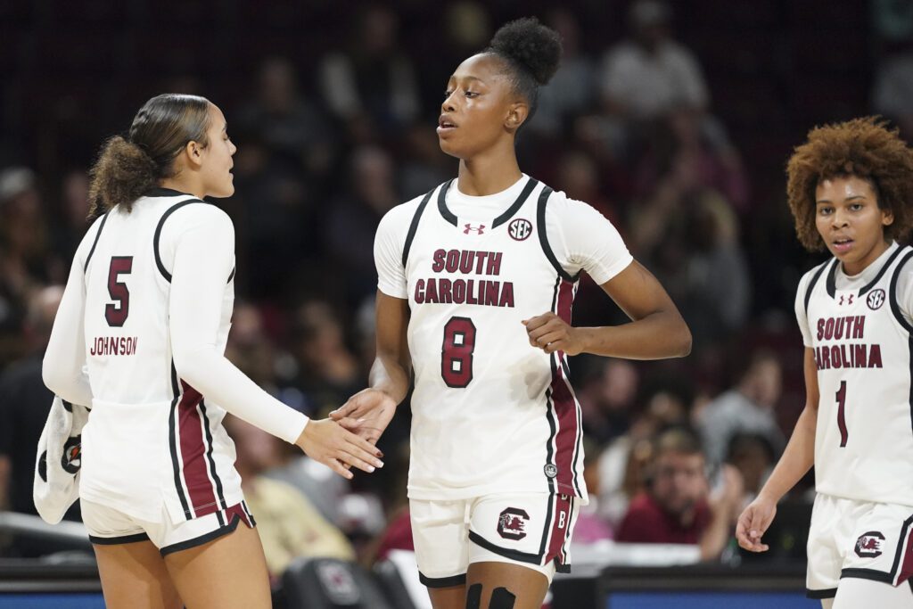 South Carolina guard Tessa Johnson high-fives forward Joyce Edwards during a preseason 2025/26 NCAA basketball exhibition game.