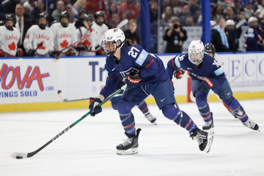 USA forward Taylor Heise takes the puck up the ice during a 2025 Rivalry Series game against Canada.