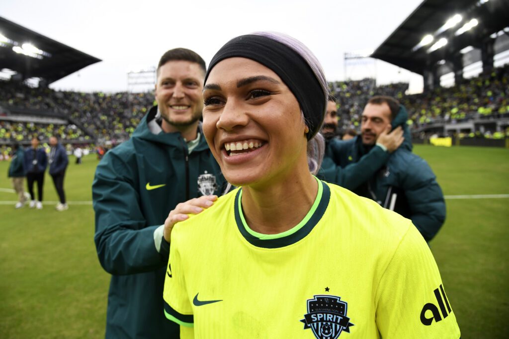 Washington Spirit star Trinity Rodman smiles after her club's win in the 2025 NWSL semifinals.