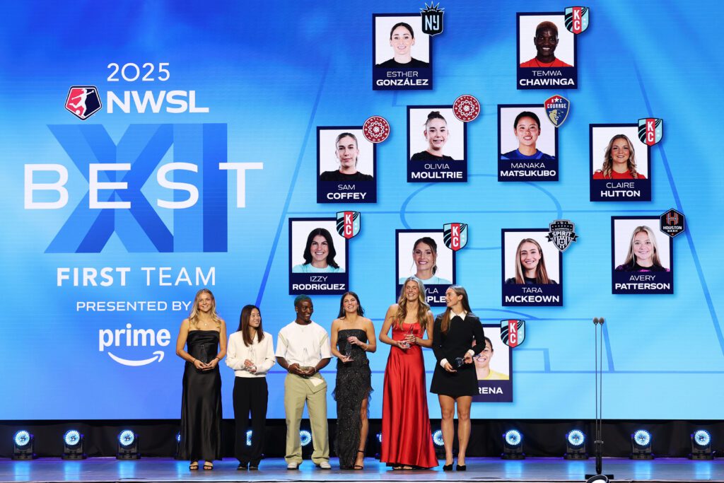 Claire Hutton #14 of Kansas City Current, Manaka Matsukubo #34 of NC Courage, Temwa Chawinga #6 of Kansas City Current, Izzy Rodriguez #18 of Kansas City Current, Kayla Sharples #27 of Kansas City Current and Tara McKeown #9 of Washington Spirit receive the Best XI award, presented by Amazon Prime during the 2025 NWSL Awards Presented by AT&T at Montgomery Theater on November 19, 2025 in San Jose, California.