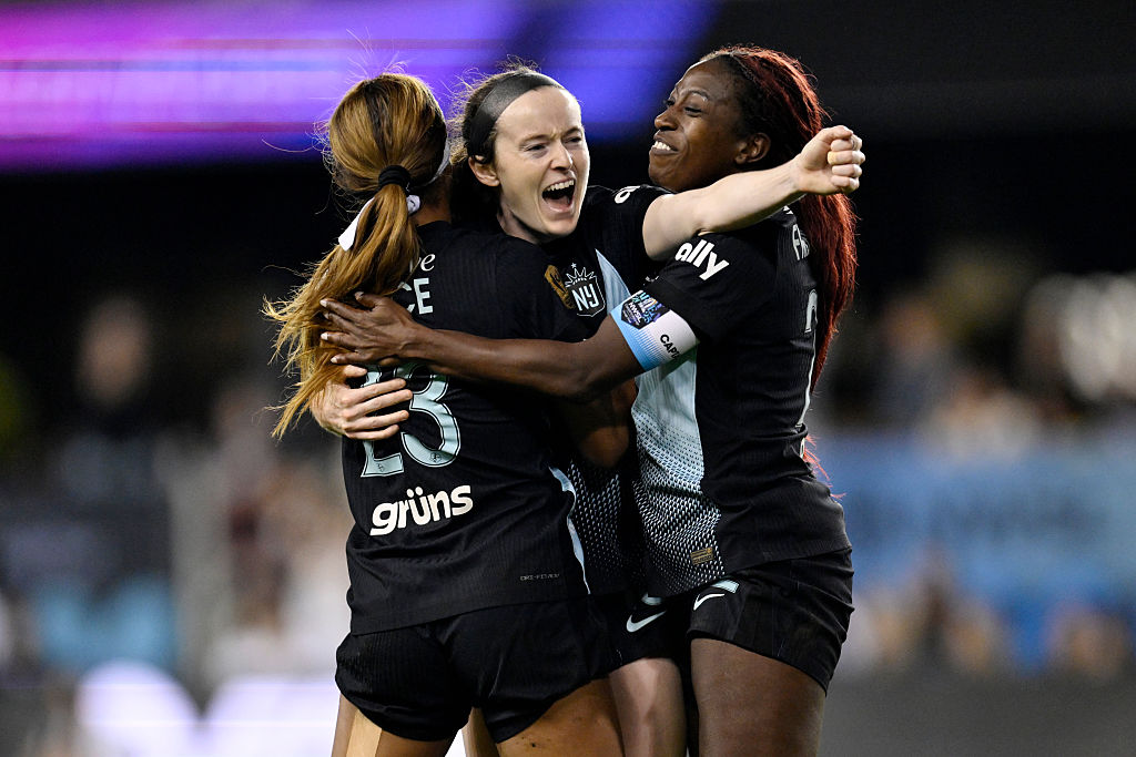 Rose Lavelle #16 of NJ/NY Gotham FC celebrates with teammates Midge Purce #23 and Mandy Freeman #22 as they become champions after winning during the NWSL Championship 2025 final between Washington Spirit and NJ/NY Gotham FC at PayPal Park on November 22, 2025 in San Jose, California.  