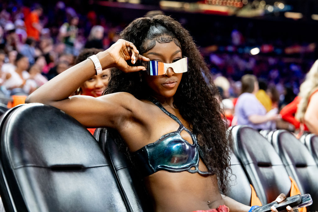 LSU star Flau'jae Johnson looks on during the 2024 WNBA All Star Game at Footprint Center on July 20, 2024 in Phoenix, Arizona.