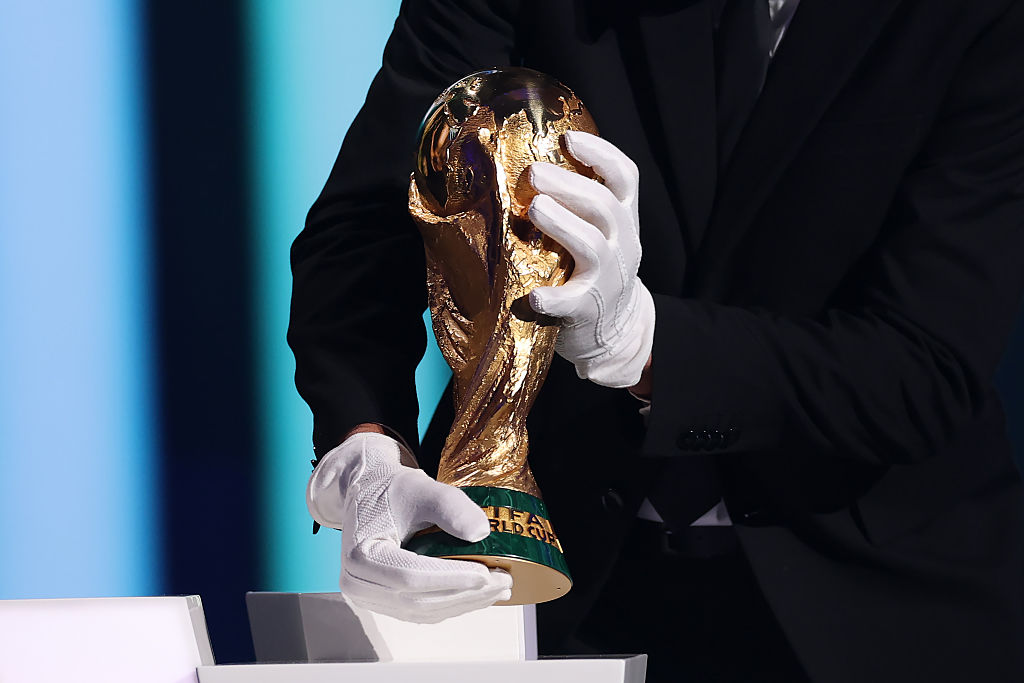 The FIFA World Cup Trophy is seen on stage during the FIFA World Cup 2026 Official Draw at John F. Kennedy Center for the Performing Arts on December 05, 2025 in Washington, DC.