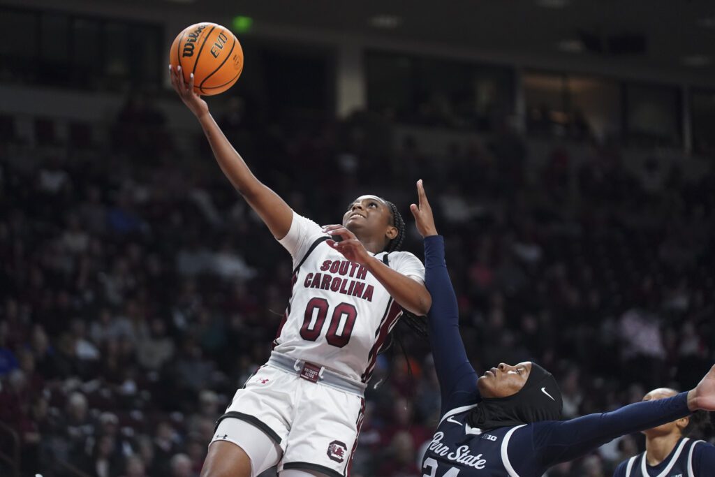 Penn State guard Shayla Smith defends a shot from South Carolina guard Ta'Niya Latson during a 2025/26 NCAA basketball game.