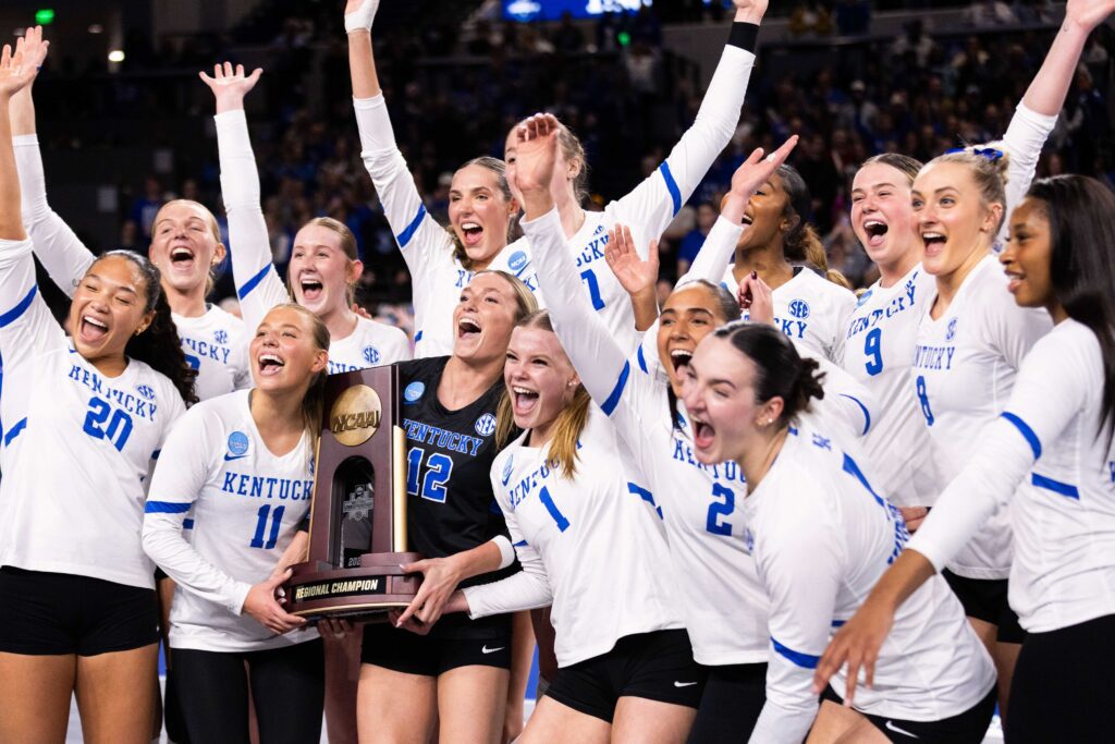 The Kentucky Wildcats celebrate their Elite Eight win during the 2025 NCAA volleyball tournament.