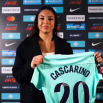 French attacker Delphine Cascarino poses with her London City jersey after signing with the WSL club.