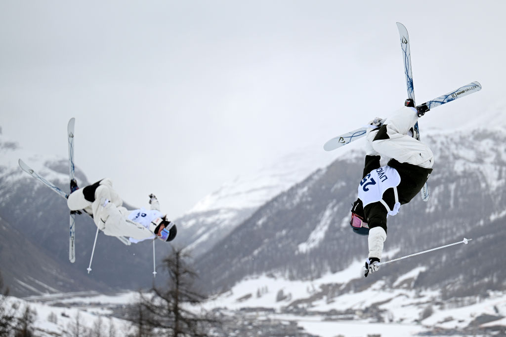 Charlotte Wilson of Team Australia (R) and Maia Schwinghammer of Team Canada compete in Heat 6 1/8 Final of the Women's Dual Moguls during the FIS World Cup Aerials & Moguls on March 12, 2025 in Livigno, Italy. The World Cup is an official test event for the XXV edition of the Winter Olympics, which will be held in Milan and Cortina d'Ampezzo in 2026.