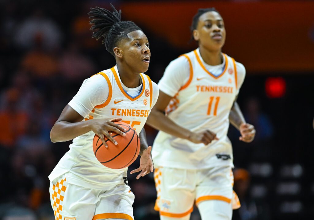 Tennessee guard Talaysia Cooper brings the ball up the court as forward Zee Spearman follows during a 2025/26 NCAA basketball game.