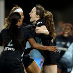 Gotham FC star Rose Lavelle celebrates her title-winning goal with teammates Midge Purce and Jaedyn Shaw during the 2025 NWSL Championship match.