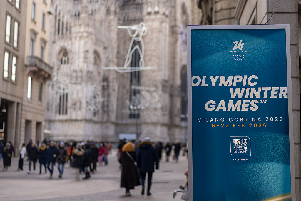 Advertising banner for the Milano Cortina 2026 Winter Olympics stands near Piazza Duomo on January 25, 2026 in Milan, Italy. 