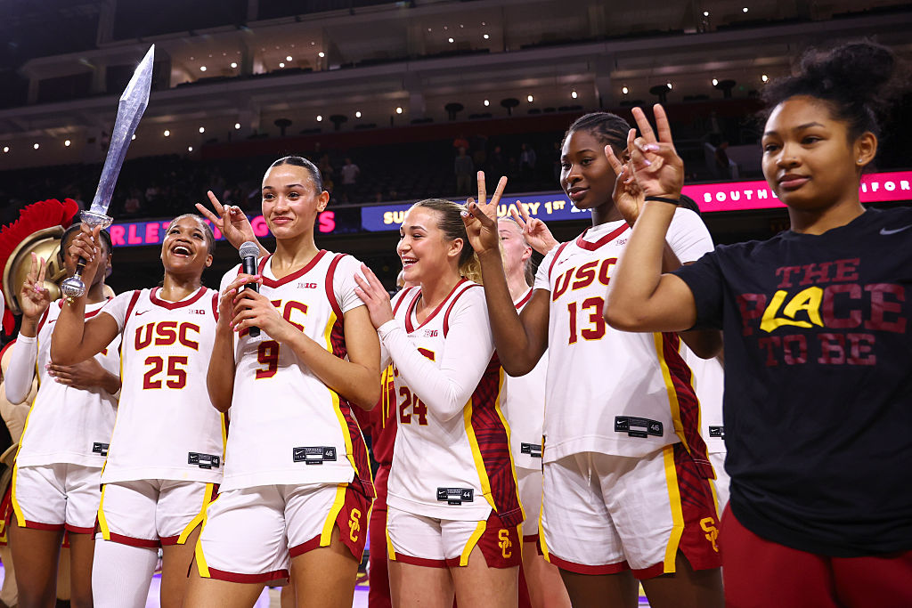 zy Davidson #9, Brooklyn Shamblin #24, Dayana Mendes #13 and Malia Samuels #10 of the USC Trojans celebrate after the iowa vs usc game against Iowa women's basketball at Galen Center on January 29, 2026 in Los Angeles, California.