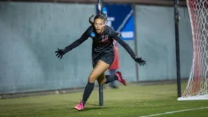 Stanford senior midfielder Jasmine Aikey reacts to a play during an NCAA soccer match.