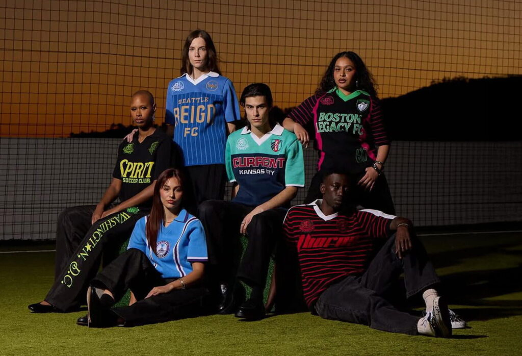 Models pose wearing knitwear jerseys from the new NWSL x Dead Dirt collection.
