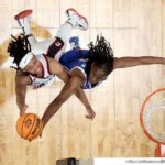 KK Arnold #2 of the UConn Huskies shoots against Jadyn Donovan #4 of the Duke Blue Devils in the Sweet 16 round of the NCAA Women's Basketball Tournament at Moda Center on March 30, 2024 in Portland, Oregon.