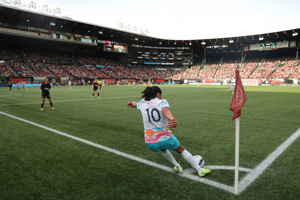 San Diego Wave midfielder Kenza Dali launches a corner kick during a 2025 NWSL quarterfinals match.