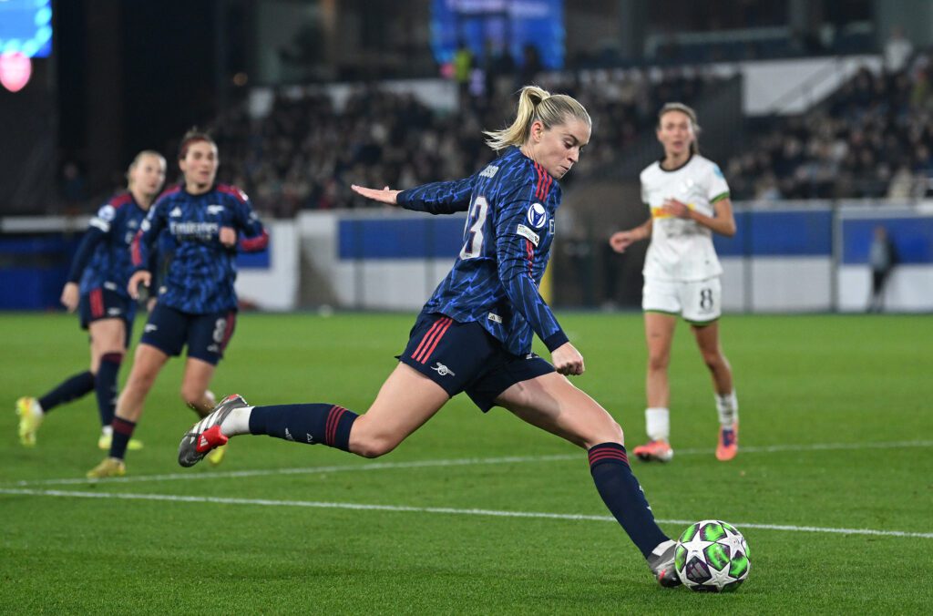 Arsenal forward Alessia Russo crosses the ball into the box during a 2025/26 UWCL league-phase match.
