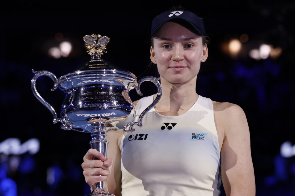 Kazakhstan tennis star Elena Rybakina poses holding the Daphne Akhurst Memorial Cup after winning the 2026 Australian Open.