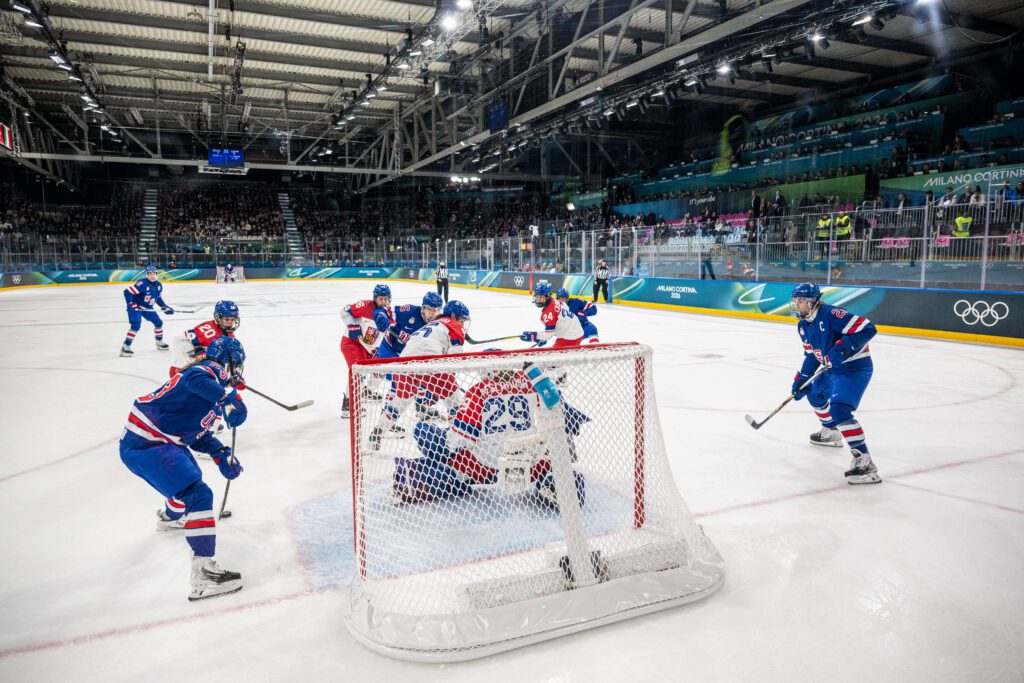 Team USA women's hockey battles Team Czechia on the ice in their first game at the 2026 Winter Olympics.