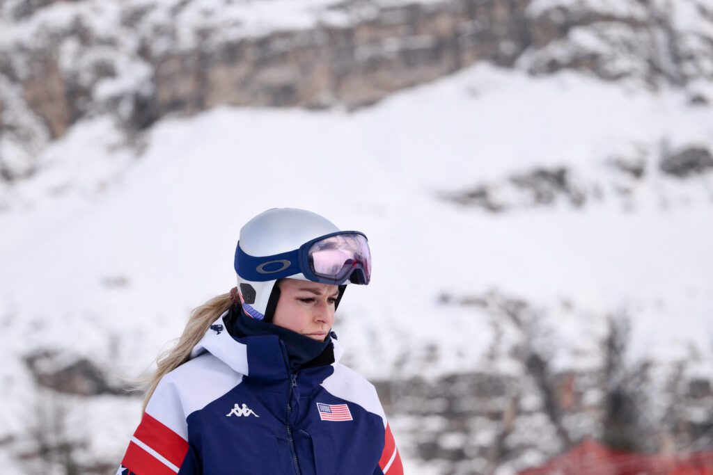 USA alpine skier Lindsey Vonn looks on during a course inspection at the 2026 Winter Olympics.
