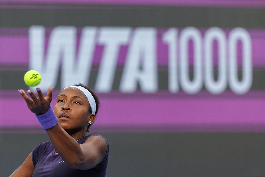 Coco Gauff of the United States serves Elisabetta Cocciaretto of Italy against during the Qatar TotalEnergies Open, part of the Hologic WTA Tour at Khalifa International Tennis and Squash Complex on February 10, 2026 in Doha, Qatar.
