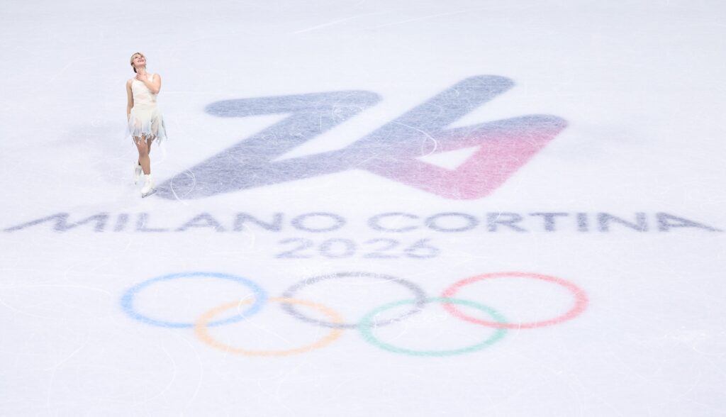 USA figure skater Alysa Liu strikes a pose ahead of her short program at the 2026 Winter Olympics.