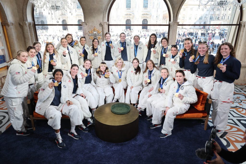 The Team USA women's hockey team and trio of women figure skaters pose with their 2026 Olympic medals during an appearance on the Today Show.