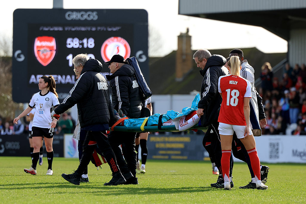 Olivia Smith of Arsenal is carried off the field on a stretcher following medical treatment after picking up an injury during the Adobe Women's FA Cup Fifth Round match between Arsenal v Bristol City at Mangata Pay UK Stadium on February 22, 2026 in Borehamwood, England.