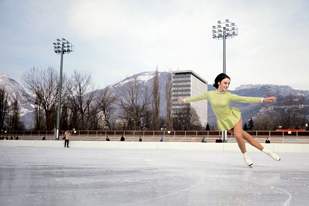 US figure skating legend Peggy Fleming practices on an outside rink in February 1968 in Grenoble (French Alps), during the Winter Olympic Games. Fleming won the gold medal.