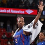 Kara Braxton #45 of the Detroit Shock waves to the audience during the WNBA game against the Chicago Sky on September 12, 2009 at the UIC Pavilion in Chicago, Illinois. The Shock won 80-69.