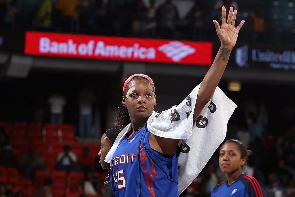 Kara Braxton #45 of the Detroit Shock waves to the audience during the WNBA game against the Chicago Sky on September 12, 2009 at the UIC Pavilion in Chicago, Illinois. The Shock won 80-69.
