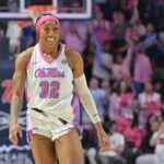 Ole Miss forward Cotie McMahon smiles after draining a three-pointer during a 2025/26 NCAA basketball game.