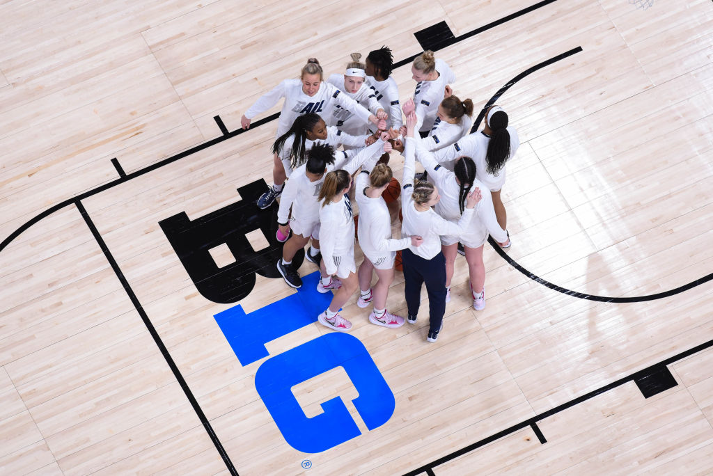 The Penn State teams huddles in front of the Big Ten logo prior to a Big Ten Basketball Tournament college basketball game between the Rutgers Scarlet Knights and the Penn State Nittany Lions on March 2, 2022 at Gainbridge Fieldhouse in Indianapolis, IN.