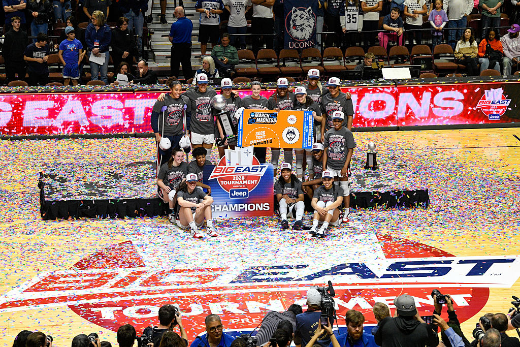 UConn Huskies players pose for a team photo following the BIG EAST Tournament Championship game between the UConn Huskies and the Villanova Wildcats on March 9, 2026 at Mohegan Sun Arena in Uncasville, CT. The Huskies defeated the Wildcats 90-51.