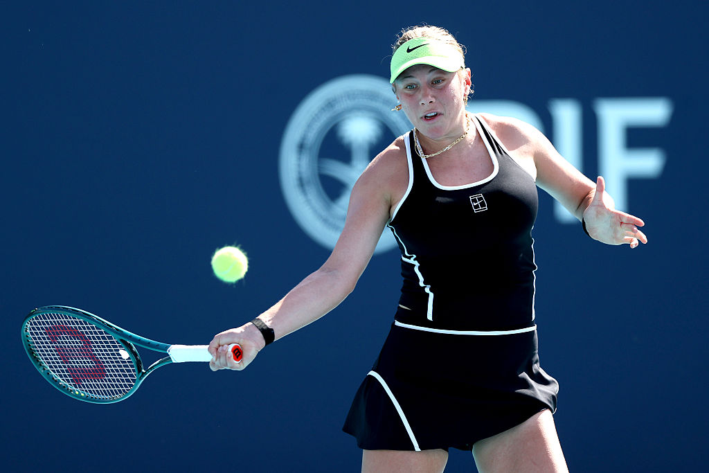 Amanda Anisimova of the United States returns a shot to Yuliia Starodubtseva of Ukraine on Day 5 of the Miami Open Presented by Itau at Hard Rock Stadium on March 21, 2026 in Miami Gardens, Florida.
