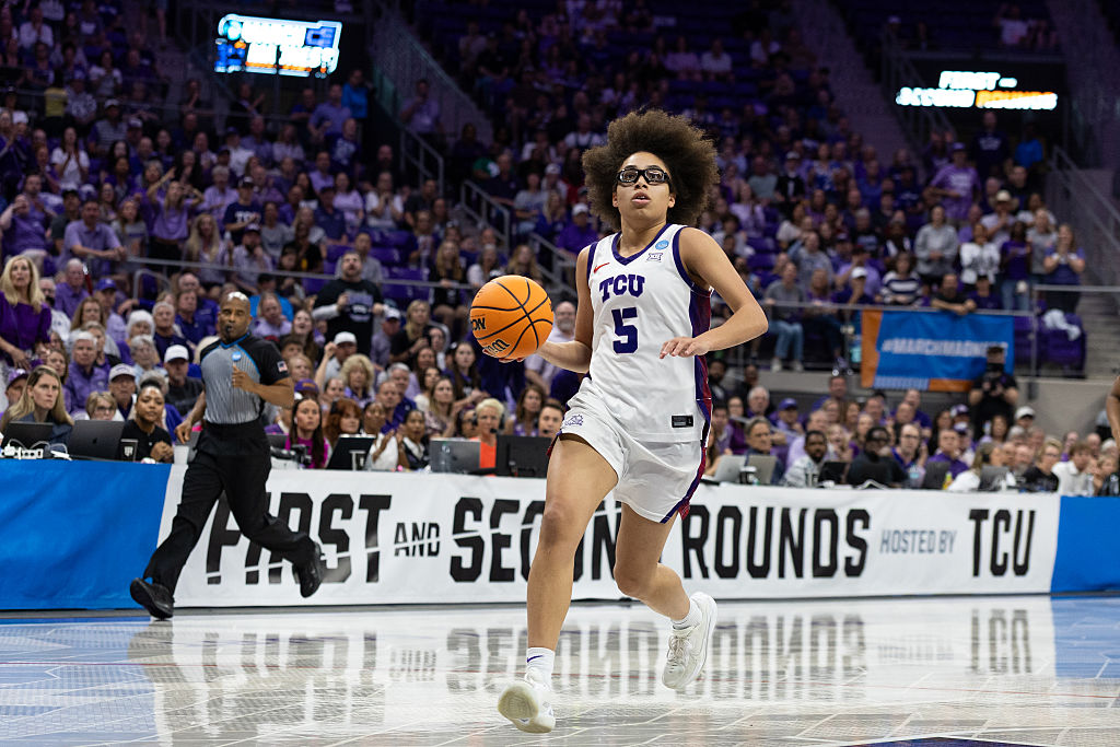 Olivia Miles #5 of the Texas Christian University Horned Frogs drives to the basket in the second round of the 2026 NCAA Women's Basketball Tournament game between University of Washington and Texas Christian University at Schollmaier Arena on March 22, 2026 in Fort Worth, Texas.
