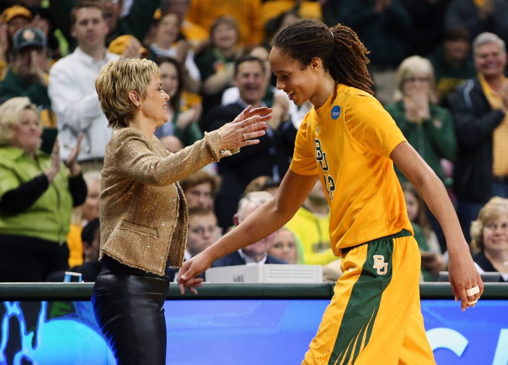 March Madness Baylor Bears center Brittney Griner (42) greets head coach Kim Mulkey after coming out of the game during the second half against the Florida State Seminoles during the second round of the 2013 NCAA womens basketball tournament at the Ferrell Center. 