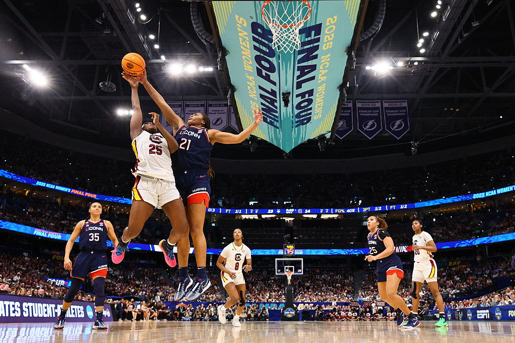 Sarah Strong #21 of the UConn Huskies blocks a shot by Raven Johnson #25 of the South Carolina Gamecocksduring the Division I Women's Basketball Championship game at Amalie Arena on April 6, 2025 in Tampa, Florida.
