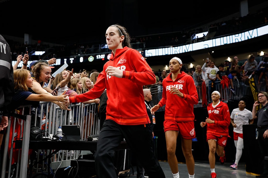 2026 WNBA broadcast schedule driver Caitlin Clark #22 of the Indiana Fever runs out of the team tunnel, to the court before the game against the Seattle Storm at Climate Pledge Arena on June 24, 2025 in Seattle, Washington. The Indiana Fever won 94-86.