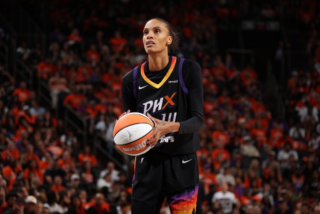 DeWanna Bonner #14 of the Phoenix Mercury shoots a free throw during the game against the Las Vegas Aces during Game Three of the WNBA Finals on October 8, 2025 at Mortgage Matchup Center in Phoenix, Arizona.