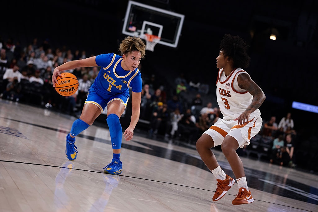 Final Four contenders Kiki Rice #1 of the UCLA Bruins drives to the basket during the second half against the Texas Longhorns during the Players Era Championship basketball tournament at Michelob ULTRA Arena on November 26, 2025 in Las Vegas, Nevada.