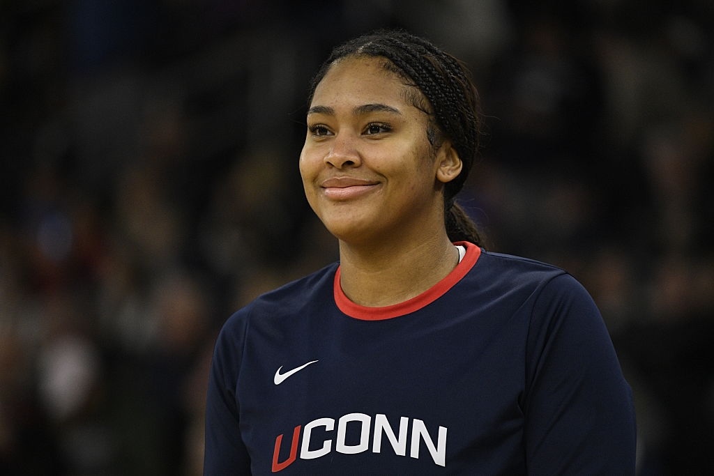 Sarah Strong #21 of the UConn Huskies smiles during halftime of the women's college basketball game between the UConn Huskies and the Providence College Friars on December 31, 2025, at Amica Mutual Pavilion in Providence, RI.
