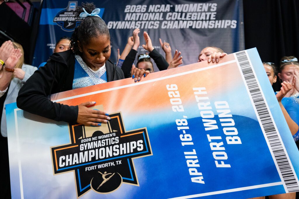 Jordan Chiles of the UCLA Bruins holds a team ticket to the NCAA National Championship at Gill Coliseum on April 5, 2026 in Corvallis, Oregon.
