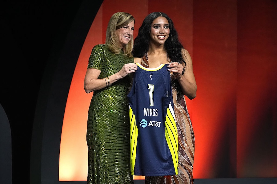 Azzi Fudd of UConn poses with WNBA Commissioner Cathy Engelbert after being selected with the 1st pick in the first round by the Dallas Wings.