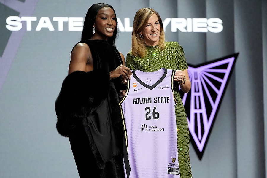 Flau'jae Johnson (L) of LSU poses with WNBA Commissioner Cathy Engelbert (R) after being selected with the 8th pick in the first round by the Golden State Valkyries during the 2026 WNBA Draft.