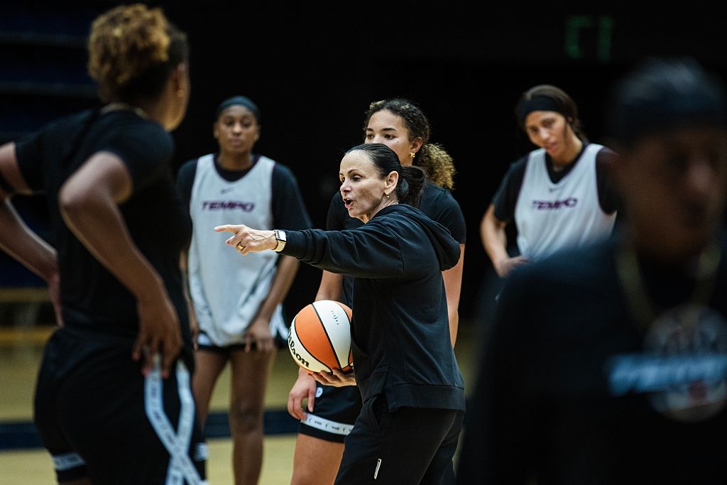 Toronto Tempo head coach Sandy Brondello works with players on the Tempo WNBA team as they practice during training camp at the University of Toronto ahead of the WNBA preseason.