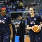 Jackie Young #13 and Caitlin Clark #12 of the USA Women's National Team warm up before the game against Puerto Rico during the 2026 FIBA World Cup Qualifying Tournament on March 12, 2026 at Coliseo Jose Miguel Agrelot in San Juan, Puerto Rico.