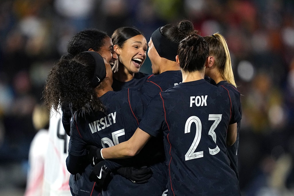 USWNT player Naomi Girma #4 of United States celebrates with teammates after scoring the team's first goal during the international friendly match between United States and Japan at Dick's Sporting Goods Park on April 17, 2026 in Commerce City, Colorado.
