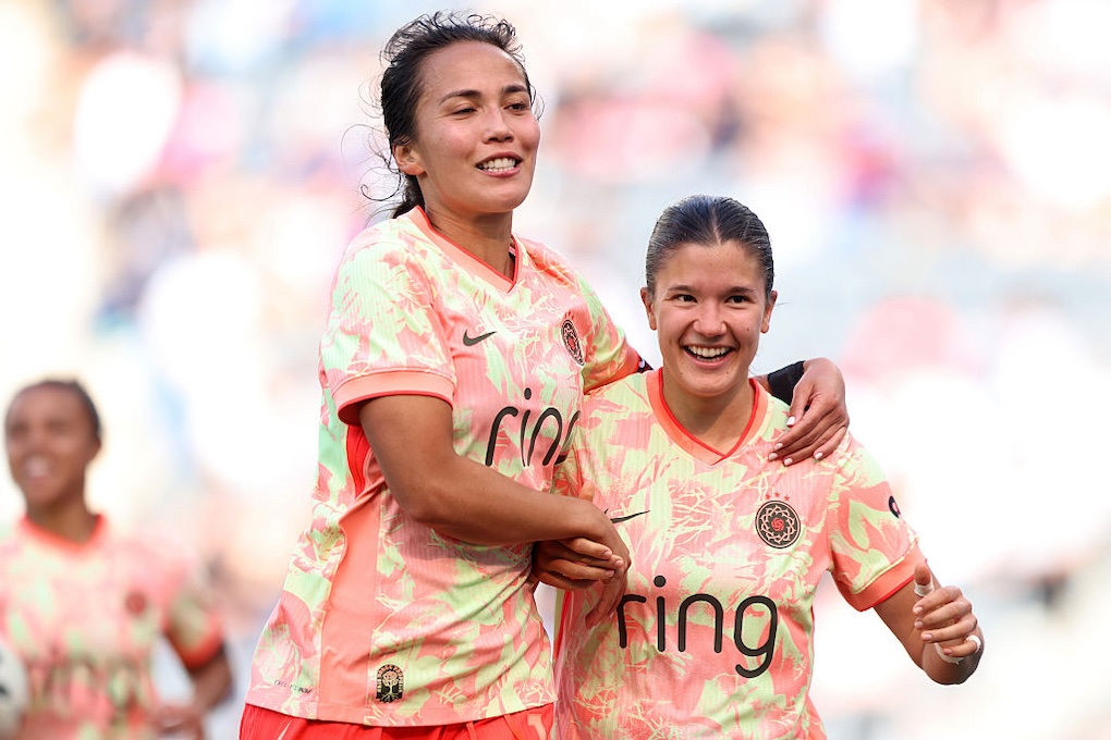 Pietra Tordin #19 of Portland Thorns FC celebrates scoring team's first goal with teammate Sam Hiatt #16 during the NWSL match between Angel City FC and Portland Thorns FC at BMO Stadium on April 26, 2026 in Los Angeles, California.