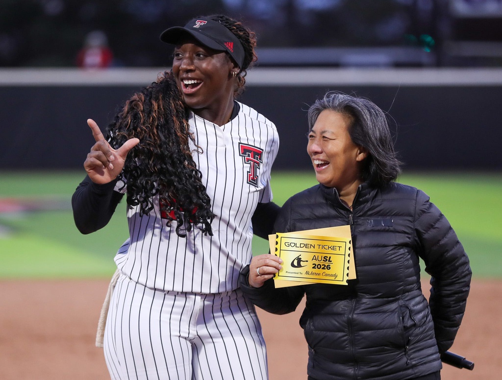 Texas Tech's NiJaree Canady receives a golden ticket to the 2026 draft from AUSL commissioner Kim Ng, Friday, March 27, 2026, at Tracy Sellers Field.